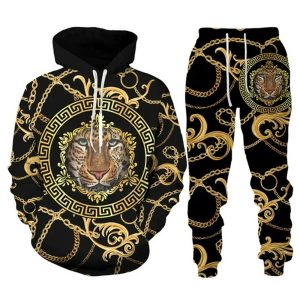 Black tracksuit set with gold chain and tiger face print, including hoodie and matching pants.