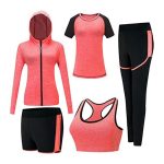 Coral and black women’s activewear set including sports bra, leggings, shorts, t-shirt, and hooded jacket
