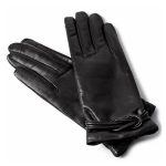 Women’s black leather dress gloves with decorative bow detail.