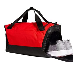 Red and black sports duffle bag with dedicated shoe compartment and dual handles.