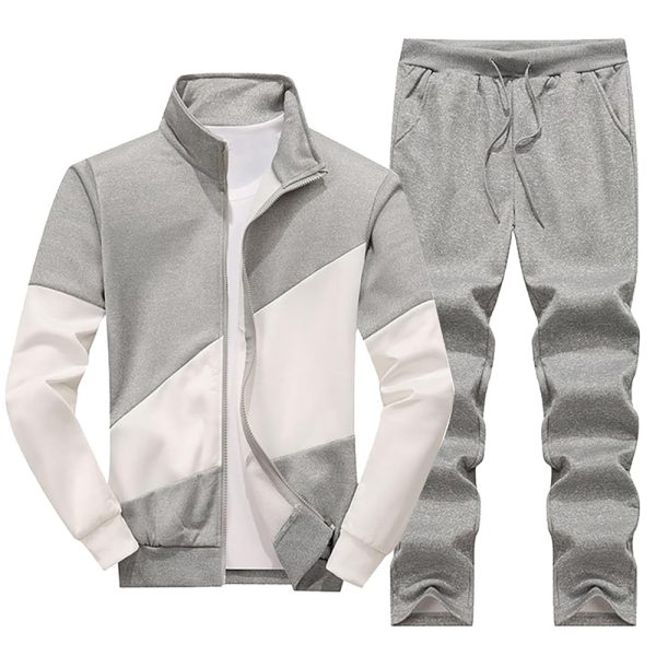 Light grey and white color block men’s tracksuit set with zip-up jacket and drawstring pants.