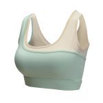 Mint and cream dual-tone scoop neck sports bra with wide straps for support.