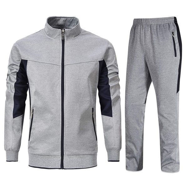 Grey men’s tracksuit set with black panels, zip-up jacket, and matching jogger pants.