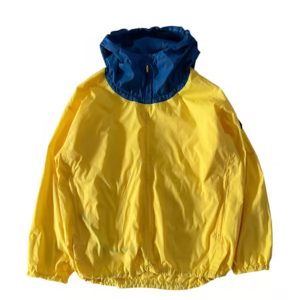 Yellow windbreaker jacket with blue hood, lightweight men’s outdoor jacket.