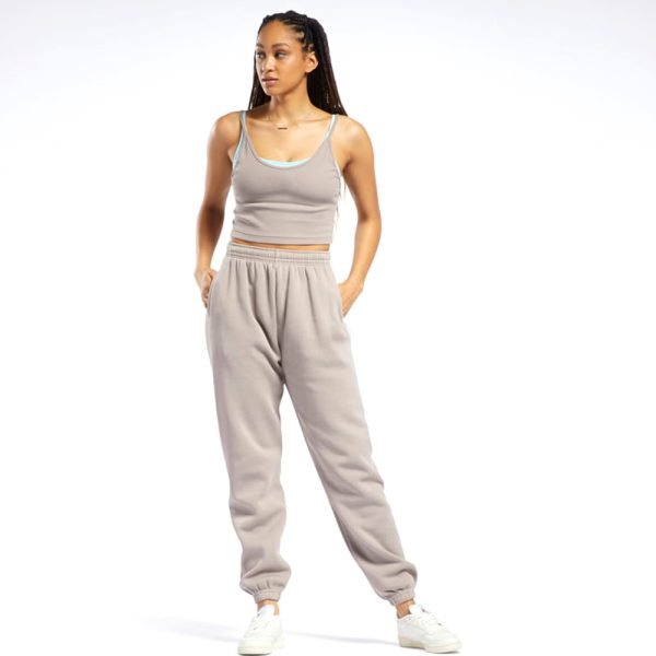 Women’s light taupe relaxed fit high-waisted joggers with elastic waistband and ankle cuffs.