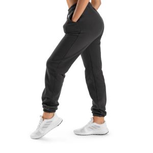 Women’s black slim fit high-waisted joggers with fleece lining and side pockets.